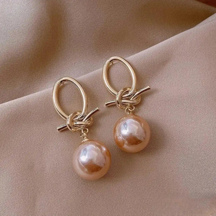 Brincos Elegantes de Pérola Rosa