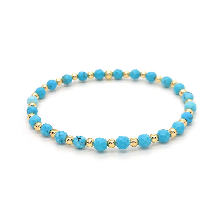 Pulseira de Charme Cruz em Pérolas Turquesa Vintage