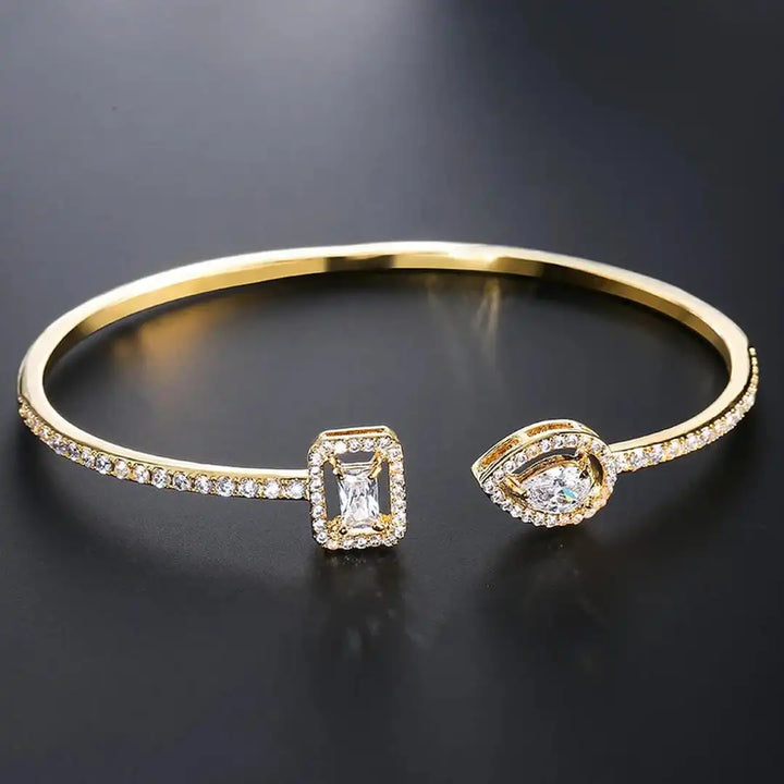 Bracelete Aberto em Ouro com Duas Pedras